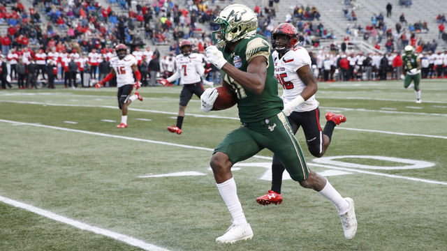 BIRMINGHAM, AL - DECEMBER 23: Marquez Valdes-Scantling #11 of the South Florida Bulls runs toward the end zone with a 64-yard touchdown reception against the Texas Tech Red Raiders in the second half of the Birmingham Bowl at Legion Field on December 23, 2017 in Birmingham, Alabama. South Florida won 38-34.