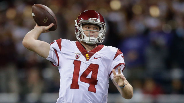 SEATTLE, WA - NOVEMBER 12: Quarterback Sam Darnold #14 of the USC Trojans passes against the Washington Huskies on November 12, 2016 at Husky Stadium in Seattle, Washington.