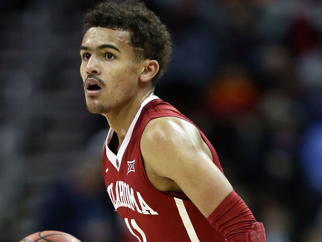 KANSAS CITY, MO - MARCH 07: Trae Young #11 of the Oklahoma Sooners controls the ball during the first round of the Big 12 Basketball Tournament against the Oklahoma State Cowboys at the Sprint Center on March 7, 2018 in Kansas City, Missouri.