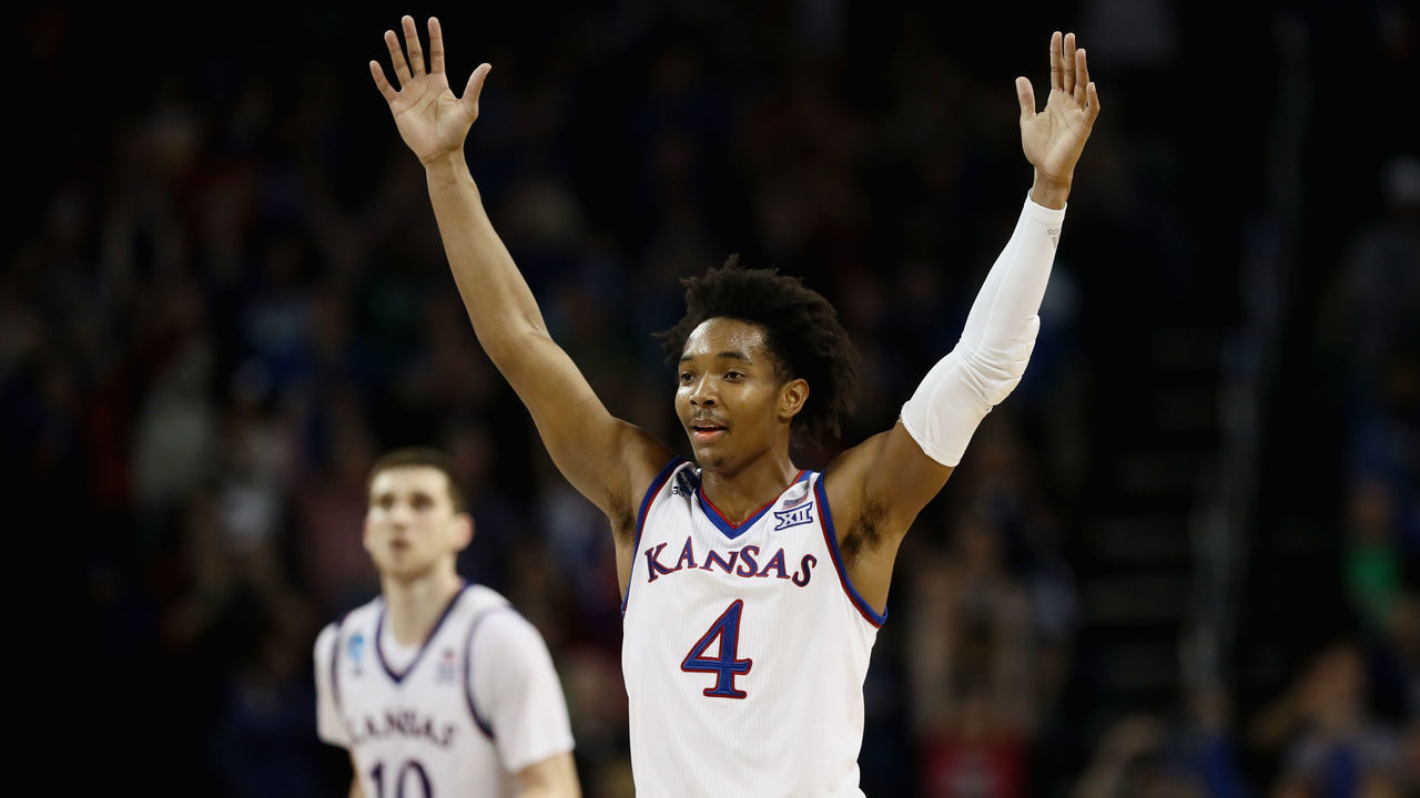 WICHITA, KS - MARCH 17: Devonte' Graham #4 of the Kansas Jayhawks reacts against the Seton Hall Pirates in the second half during the second round of the 2018 NCAA Men's Basketball Tournament at INTRUST Bank Arena on March 17, 2018 in Wichita, Kansas.
