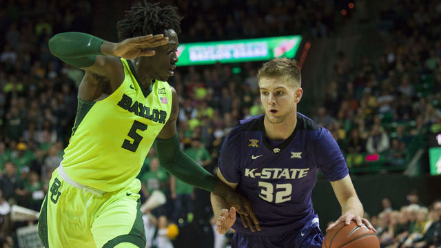 WACO, TX - FEBRUARY 4: Dean Wade #32 of the Kansas State Wildcats drives to the basket against Johnathan Motley #5 of the Baylor Bears on February 4, 2017 at the Ferrell Center in Waco, Texas.