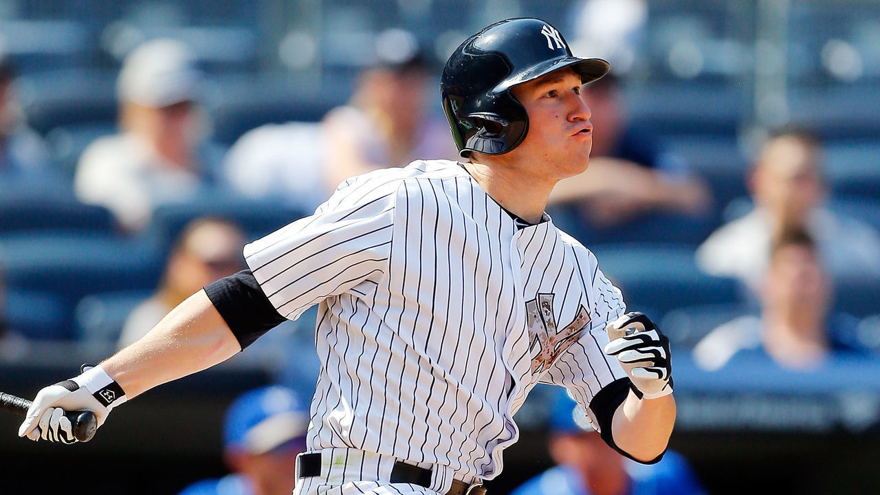 NEW YORK, NY - MAY 25: Slade Heathcott #55 of the New York Yankees follows through on a seventh inning two run home run against the Kansas City Royals at Yankee Stadium on May 25, 2015 in the Bronx borough of New York City. The home run was the first in the major leagues for Heathcott.