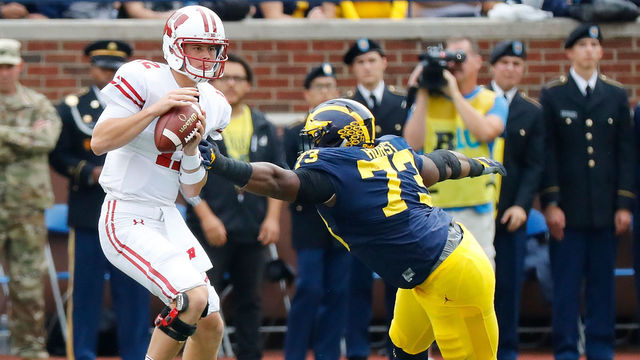 ANN ARBOR, MI - OCTOBER 01: Maurice Hurst #73 of the Michigan Wolverines rushes quarterback Alex Hornibrook #12 of the Wisconsin Badgers during the second quarter of the game at Michigan Stadium on October 1, 2016 in Ann Arbor, Michigan.