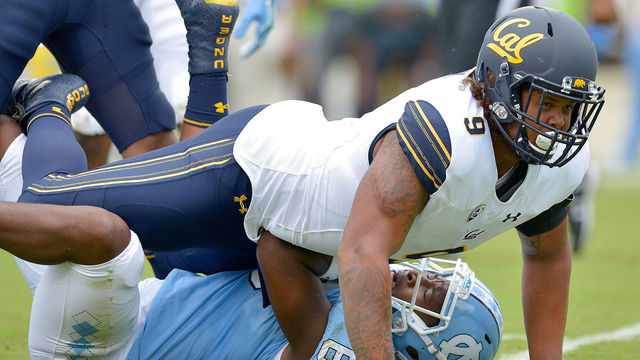 CHAPEL HILL, NC - SEPTEMBER 02: James Looney #9 of the California Golden Bears sacks Brandon Harris #6 of the North Carolina Tar Heels during their game at Kenan Stadium on September 2, 2017 in Chapel Hill, North Carolina. Cal won 35-30.