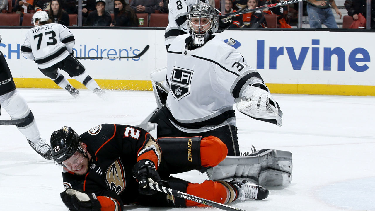 ANAHEIM, CA - JANUARY 19: Ondrej Kase #25 of the Anaheim Ducks battles in front of the net against Jonathan Quick #32 of the Los Angeles Kings during the game on January 19, 2018 at Honda Center in Anaheim, California.