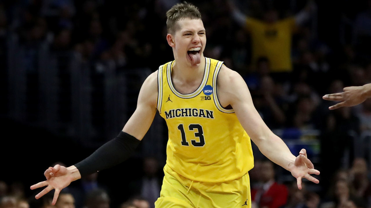 LOS ANGELES, CA - MARCH 22: Moritz Wagner #13 of the Michigan Wolverines celebrates after Wagner makes a three-pointer in the first half against the Texas A&M Aggies in the 2018 NCAA Men's Basketball Tournament West Regional at Staples Center on March 22, 2018 in Los Angeles, California.
