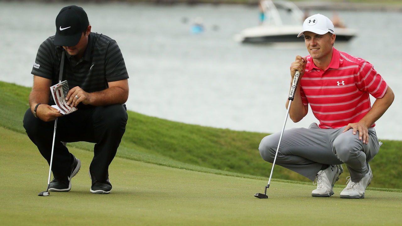 AUSTIN, TX - MARCH 23: Jordan Spieth of the United States and Patrick Reed of the United States prepare to putt on the 14th green during the third round of the World Golf Championships-Dell Match Play at Austin Country Club on March 23, 2018 in Austin, Texas.
