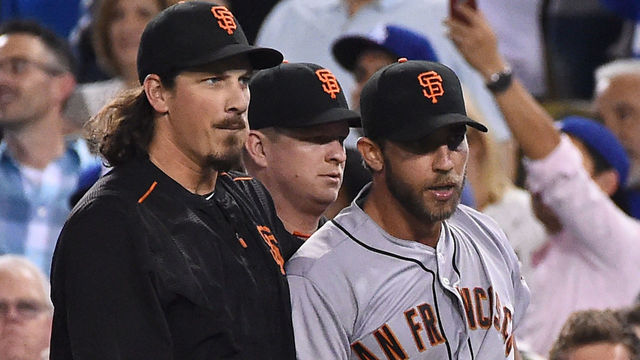 LOS ANGELES, CA - SEPTEMBER 19: Jeff Samardzija #29 of the San Francisco Giants holds back Madison Bumgarner #40 of the San Francisco Giants after benches cleared after the final out of the seventh inning of the game against the Los Angeles Dodgers at Dodger Stadium on September 19, 2016 in Los Angeles, California.