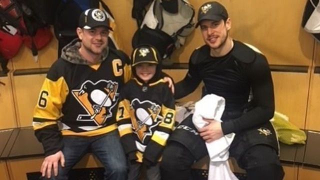 9-year-old viral video star spends day with Penguins