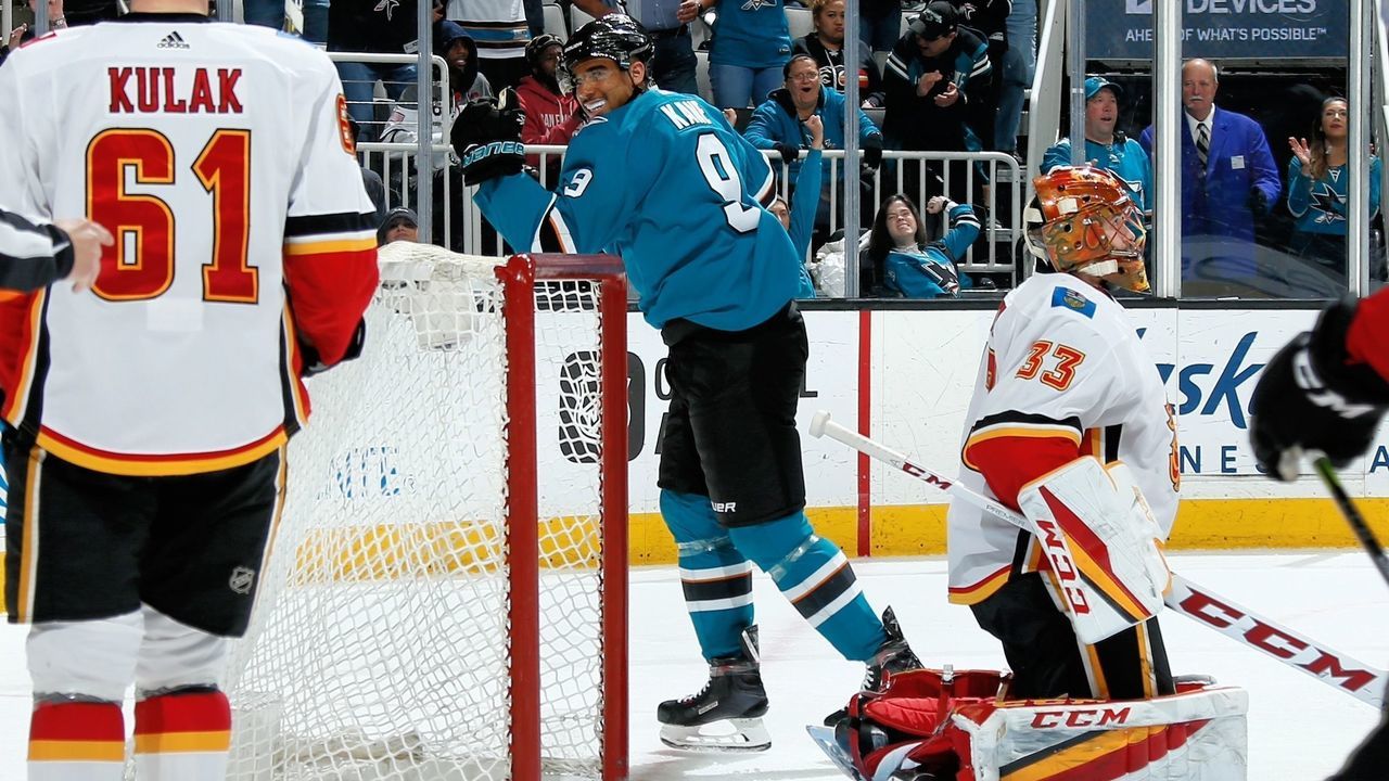 SAN JOSE, CA - MARCH 24: Evander Kane #9 of the San Jose Sharks reacts after tipping the puck in for a goal in third period against the Calgary Flames at SAP Center on March 24, 2018 in San Jose, California.