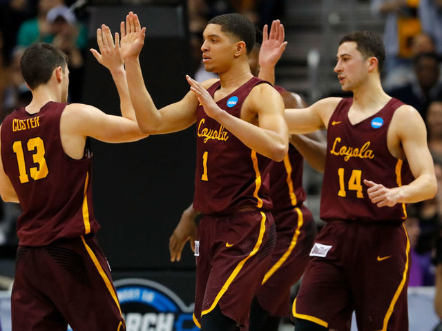 ATLANTA, GA - MARCH 24: Lucas Williamson #1, Clayton Custer #13 and Ben Richardson #14 of the Loyola Ramblers celebrate the basket against the Kansas State Wildcats in the first half during the 2018 NCAA Men's Basketball Tournament South Regional at Philips Arena on March 24, 2018 in Atlanta, Georgia.