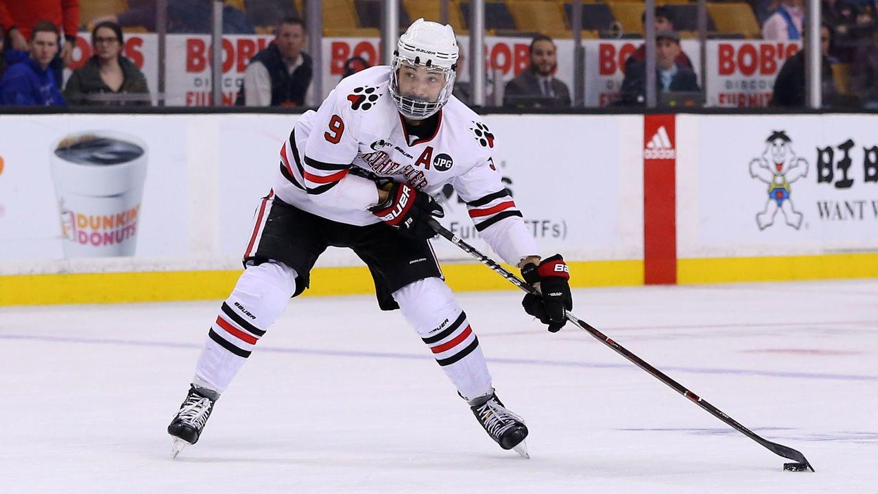 BOSTON, MA - MARCH 16: Northeastern Huskies forward Dylan Sikura (9) with the puck during a college hockey game between Providence Friars and Northeastern Huskies on March 16, 2018, at TD Garden in Boston, MA. Providence won 3-2 in overtime.