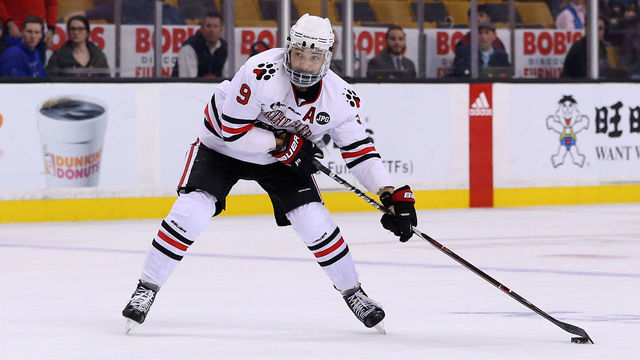 BOSTON, MA - MARCH 16: Northeastern Huskies forward Dylan Sikura (9) with the puck during a college hockey game between Providence Friars and Northeastern Huskies on March 16, 2018, at TD Garden in Boston, MA. Providence won 3-2 in overtime.