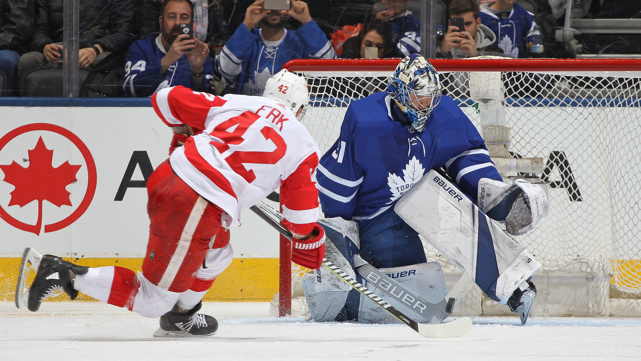 TORONTO, ON - MARCH 24: Martin Frk #42 of the Detroit Red Wings is stopped on a penalty shop against Frederik Andersen #31 of the Toronto Maple Leafs during an NHL game at the Air Canada Centre on March 24, 2018 in Toronto, Ontario, Canada.