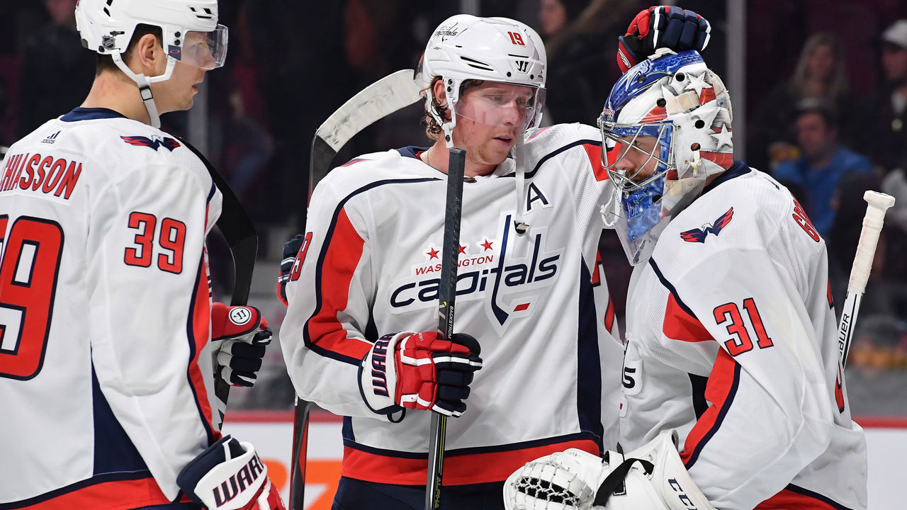 MONTREAL, QC - MARCH 24: Philipp Grubauer #31 and Nicklas Backstrom #19 of the Washington Capitals celebrate after defeating the Montreal Canadiens in the NHL game at the Bell Centre on March 24, 2018 in Montreal, Quebec, Canada.