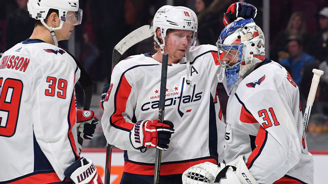 MONTREAL, QC - MARCH 24: Philipp Grubauer #31 and Nicklas Backstrom #19 of the Washington Capitals celebrate after defeating the Montreal Canadiens in the NHL game at the Bell Centre on March 24, 2018 in Montreal, Quebec, Canada.