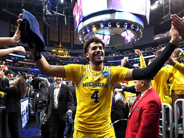 LOS ANGELES, CA - MARCH 24: Isaiah Livers #4 of the Michigan Wolverines walks off the court after defeating the Florida State Seminoles in the 2018 NCAA Men's Basketball Tournament West Regional Final at Staples Center on March 24, 2018 in Los Angeles, California. The Michigan Wolverines defeated the Florida State Seminoles 58-54.
