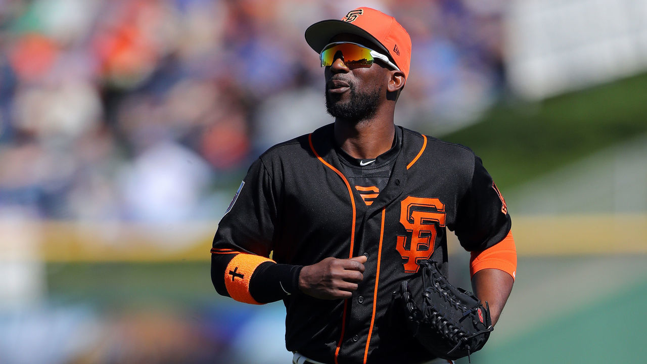 SCOTTSDALE, AZ - FEBRUARY 25: Andrew McCutchen #22 of the San Francisco Giants walks back to the dugout during a game against the Chicago Cubs on Sunday, February 25, 2018 at Scottsdale Stadium in Scottsdale, Arizona.