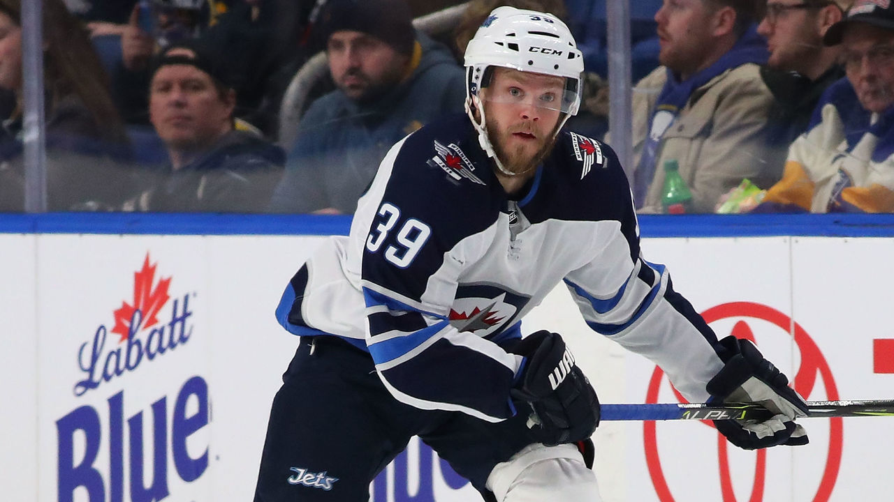 BUFFALO, NY - JANUARY 9: Toby Enstrom #39 of the Winnipeg Jets in play against the Buffalo Sabres at the KeyBank Center on January 9, 2018 in Buffalo, New York. The Jets beat the Sabres 7-4.