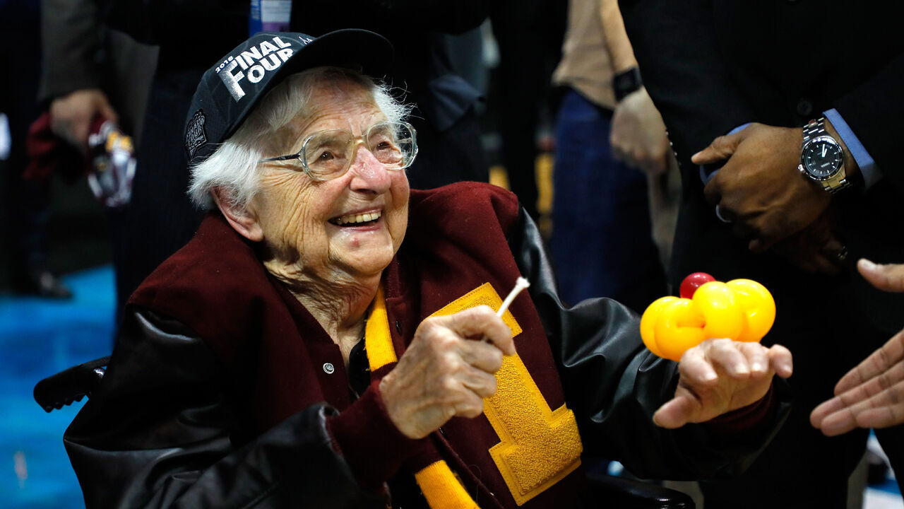 ATLANTA, GA - MARCH 24: Sister Jean Dolores Schmidt celebrates with the Loyola Ramblers after defeating the Kansas State Wildcats during the 2018 NCAA Men's Basketball Tournament South Regional at Philips Arena on March 24, 2018 in Atlanta, Georgia. Loyola defeated Kansas State 78-62.
