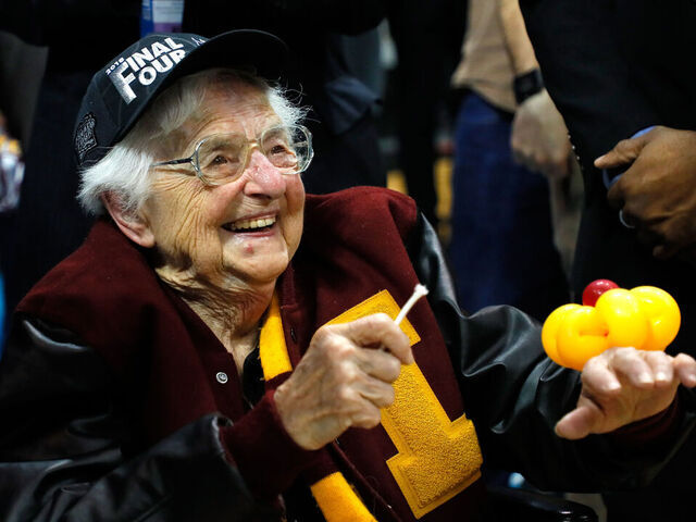 ATLANTA, GA - MARCH 24: Sister Jean Dolores Schmidt celebrates with the Loyola Ramblers after defeating the Kansas State Wildcats during the 2018 NCAA Men's Basketball Tournament South Regional at Philips Arena on March 24, 2018 in Atlanta, Georgia. Loyola defeated Kansas State 78-62.