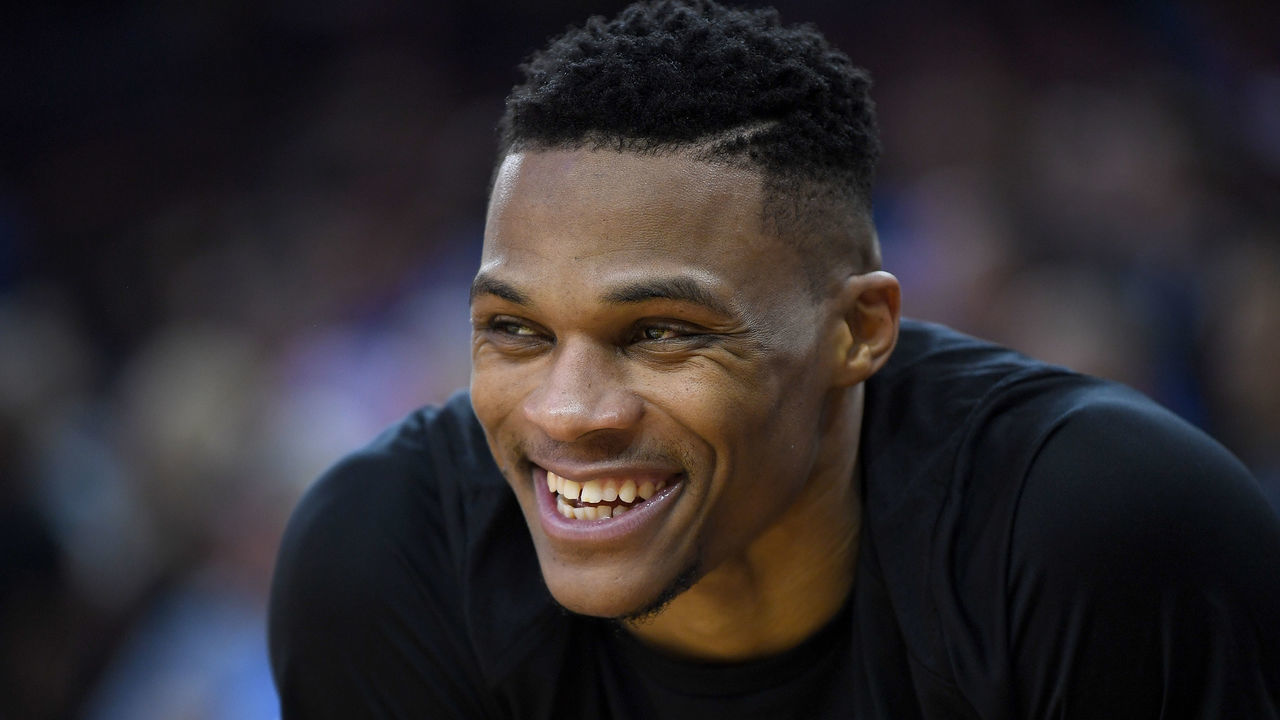 OAKLAND, CA - FEBRUARY 06: Russell Westbrook #0 of the Oklahoma City Thunder looks on smiling against the Golden State Warriors during an NBA basketball game at ORACLE Arena on February 6, 2018 in Oakland, California.