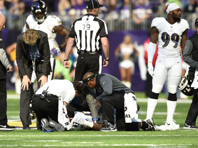 MINNEAPOLIS, MN - OCTOBER 22: Mike Wallace #17 of the Baltimore Ravens lies on the field while being assessed by medical staff in the first quarter of the game against the Minnesota Vikings on October 22, 2017 at U.S. Bank Stadium in Minneapolis, Minnesota. Wallace was ruled out of the game with a concussion.