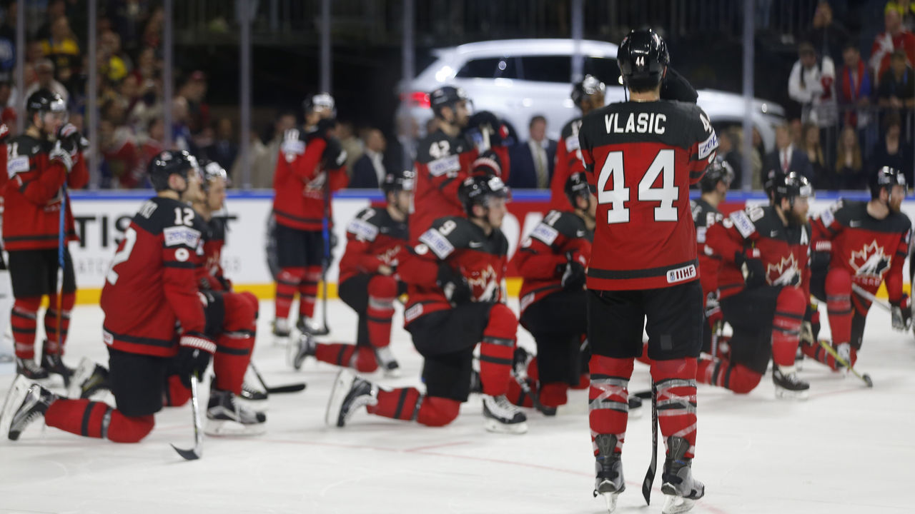 Canada's players react after losing during the IIHF Men's World Championship Ice Hockey final game match between Canada and Sweden in Cologne, western Germany, on May 21, 2017. Sweden won 2-1. / AFP PHOTO / INA FASSBENDER