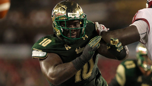 TAMPA, FL - SEPTEMBER 21: Deadrin Senat (10) of South Florida rushes the passer during the game between the Temple Owls and the USF Bulls on September 21, 2017, at Raymond James Stadium in Tampa, FL.
