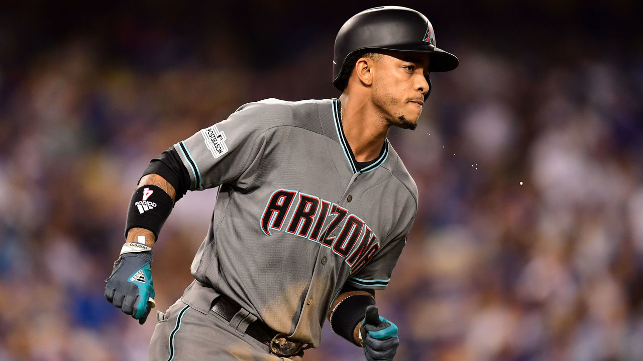 LOS ANGELES, CA - OCTOBER 06: Ketel Marte #4 of the Arizona Diamondbacks celebrates after hitting a solo home run in the seventh inning against the Los Angeles Dodgers in game one of the National League Division Series at Dodger Stadium on October 6, 2017 in Los Angeles, California.