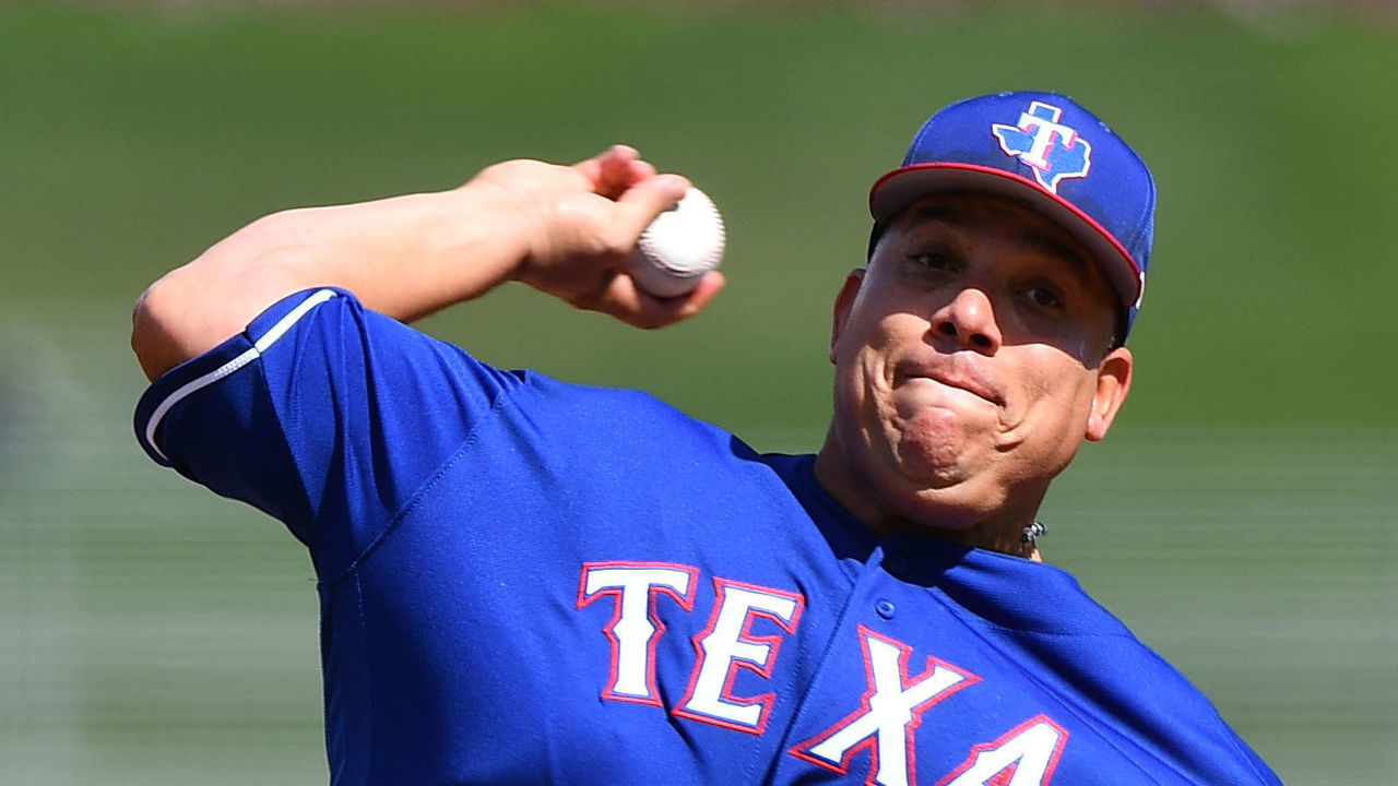 SURPRISE, AZ - MARCH 01: Bartolo Colon of the Texas Rangers pitches during the game between San Diego Padres and Texas Rangers at Surprise Stadium on March 1, 2018 in Surprise, Arizona.