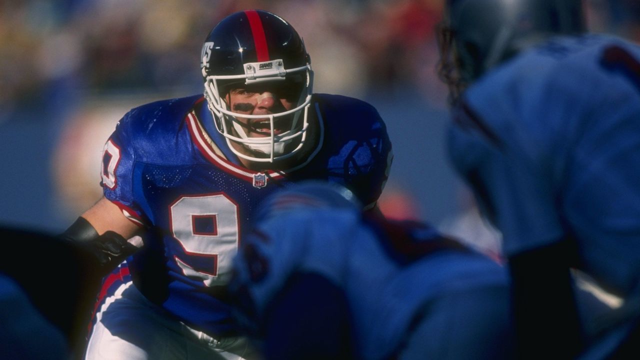 21 Dec 1996: Linebacker Corey Widmer of the New York Giants looks on during a game against the New England Patriots at Giants Stadium in East Rutherford, New Jersey. The Patriots won the game, 23-22. Mandatory Credit: Doug Pensinger /Allsport