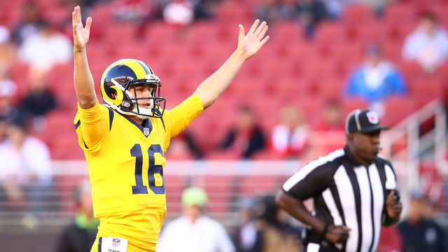 SANTA CLARA, CA - SEPTEMBER 21: Jared Goff #16 of the Los Angeles Rams celebrates after a touchdown by Todd Gurley #30 in the first quarter of during their NFL game against the San Francisco 49ers at Levi's Stadium on September 21, 2017 in Santa Clara, California.