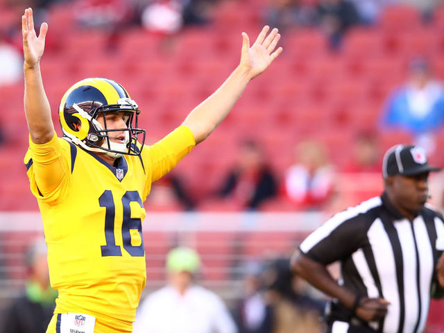 SANTA CLARA, CA - SEPTEMBER 21: Jared Goff #16 of the Los Angeles Rams celebrates after a touchdown by Todd Gurley #30 in the first quarter of during their NFL game against the San Francisco 49ers at Levi's Stadium on September 21, 2017 in Santa Clara, California.