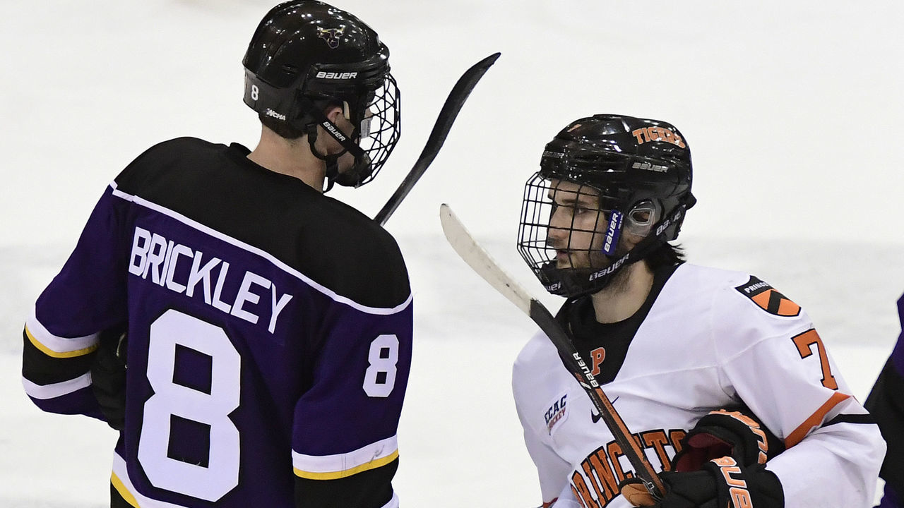 PRINCETON, NJ - DECEMBER 16: Daniel Brickley #8 of the Minnesota State Mavericks shakes hands with Liam Grande #7 of the Princeton Tigers after the game at Hobey Baker Rink on December 16, 2016 in Princeton, New Jersey. Princeton won 6-1.