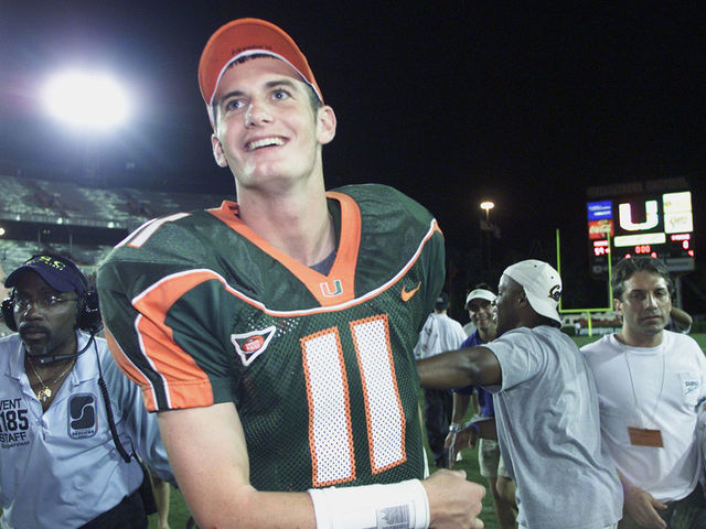 MIAMI - NOVEMBER 17: Quarterback Ken Dorsey #11 of the Miami Hurricanes smiles after the Big East Conference football game against the Syracuse Orangemen at the Orange Bowl on November 17, 2001 in Miami Florida. Miami won 59-0.