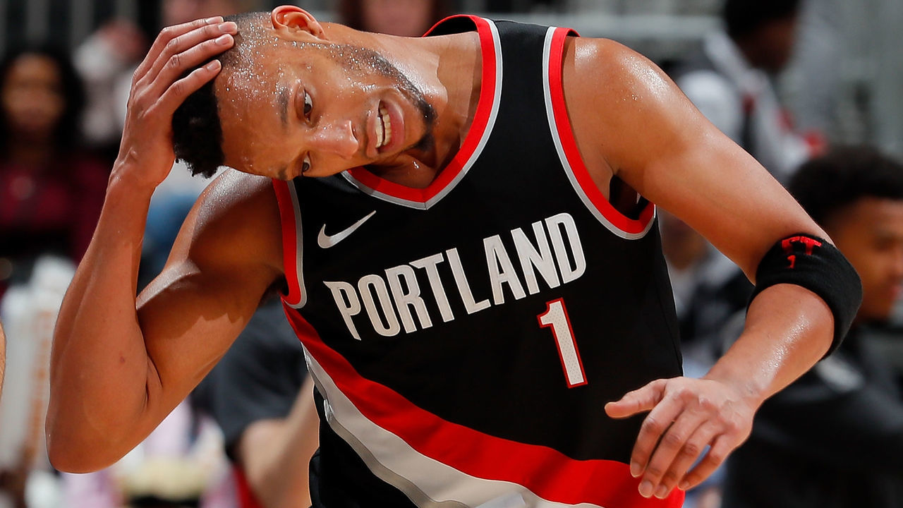 ATLANTA, GA - DECEMBER 30: Evan Turner #1 of the Portland Trail Blazers pulls down on his head as he runs down the court against the Atlanta Hawks at Philips Arena on December 30, 2017 in Atlanta, Georgia.