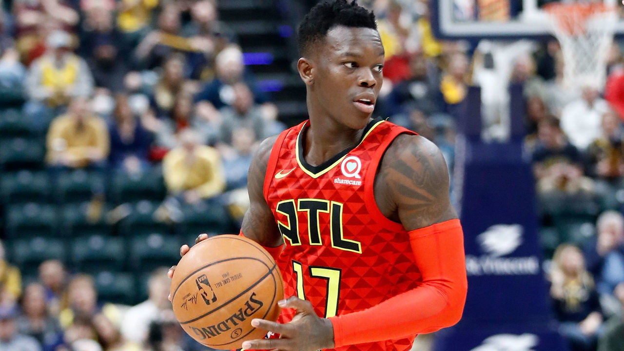 INDIANAPOLIS, IN - FEBRUARY 23: Dennis Schroder #17 of the Atlanta Hawks dribbles the ball against the Indiana Pacers during the game at Bankers Life Fieldhouse on February 23, 2018 in Indianapolis, Indiana.