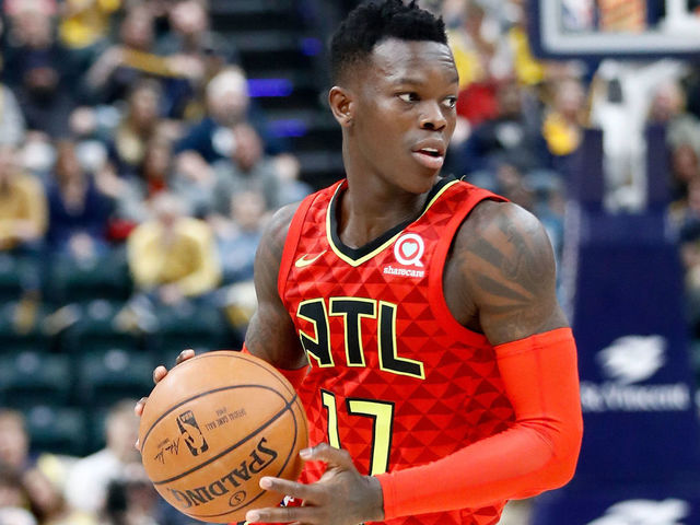 INDIANAPOLIS, IN - FEBRUARY 23: Dennis Schroder #17 of the Atlanta Hawks dribbles the ball against the Indiana Pacers during the game at Bankers Life Fieldhouse on February 23, 2018 in Indianapolis, Indiana.