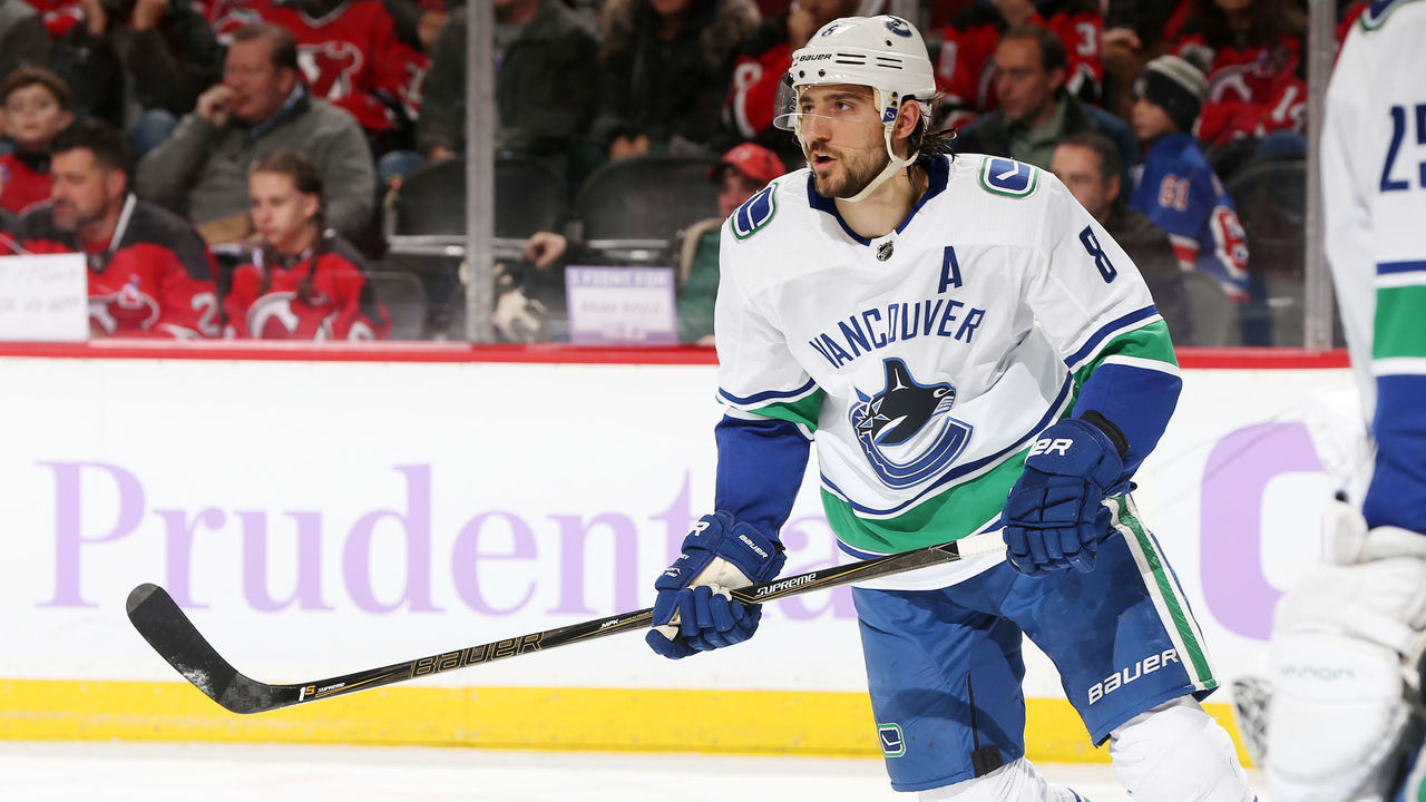 NEWARK, NJ - NOVEMBER 24: Christopher Tanev #8 of the Vancouver Canucks skates during the second period against the New Jersey Devils on November 24, 2017 at the Prudential Center in Newark, New Jersey.