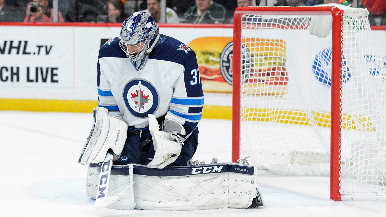 ST PAUL, MN - OCTOBER 31: Connor Hellebuyck #37 of the Winnipeg Jets defends the net against the Minnesota Wild during the game on October 31, 2017 at Xcel Energy Center in St Paul, Minnesota. The Jets defeated the Wild 2-1.