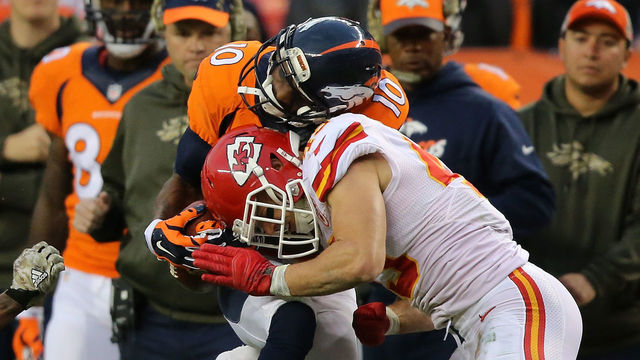 DENVER, CO - NOVEMBER 15: Daniel Sorensen #49 of the Kansas City Chiefs puts a hit on Emmanuel Sanders #10 of the Denver Broncos and breaks up a pass play in the third quarter at Sports Authority Field at Mile High on November 15, 2015 in Denver, Colorado. The Chiefs defeated the Broncos 29-13.