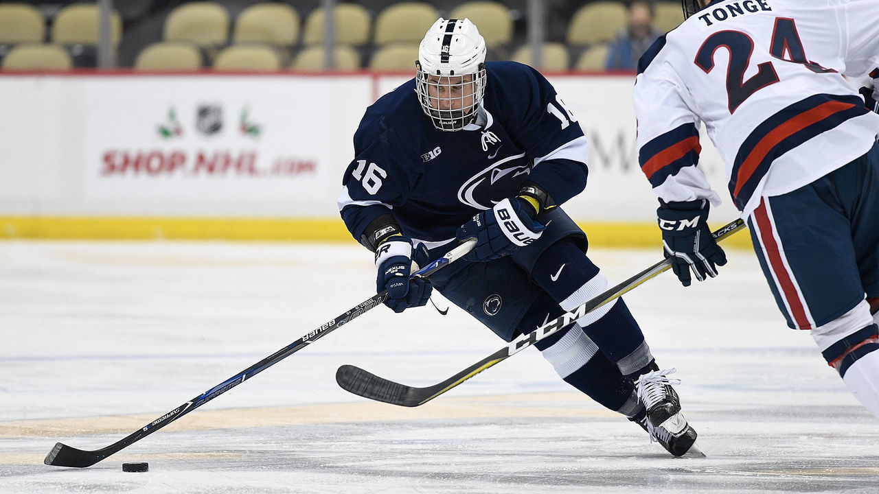 PITTSBURGH, PA - DECEMBER 08: Andrew Sturtz #16 of the Penn State Nittany Lions skates the puck up ice in the second period during the game against the Robert Morris Colonials at PPG PAINTS Arena on December 8, 2017 in Pittsburgh, Pennsylvania.