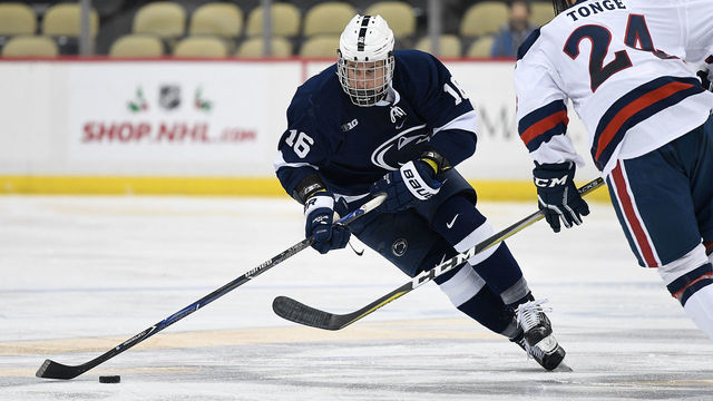 PITTSBURGH, PA - DECEMBER 08: Andrew Sturtz #16 of the Penn State Nittany Lions skates the puck up ice in the second period during the game against the Robert Morris Colonials at PPG PAINTS Arena on December 8, 2017 in Pittsburgh, Pennsylvania.