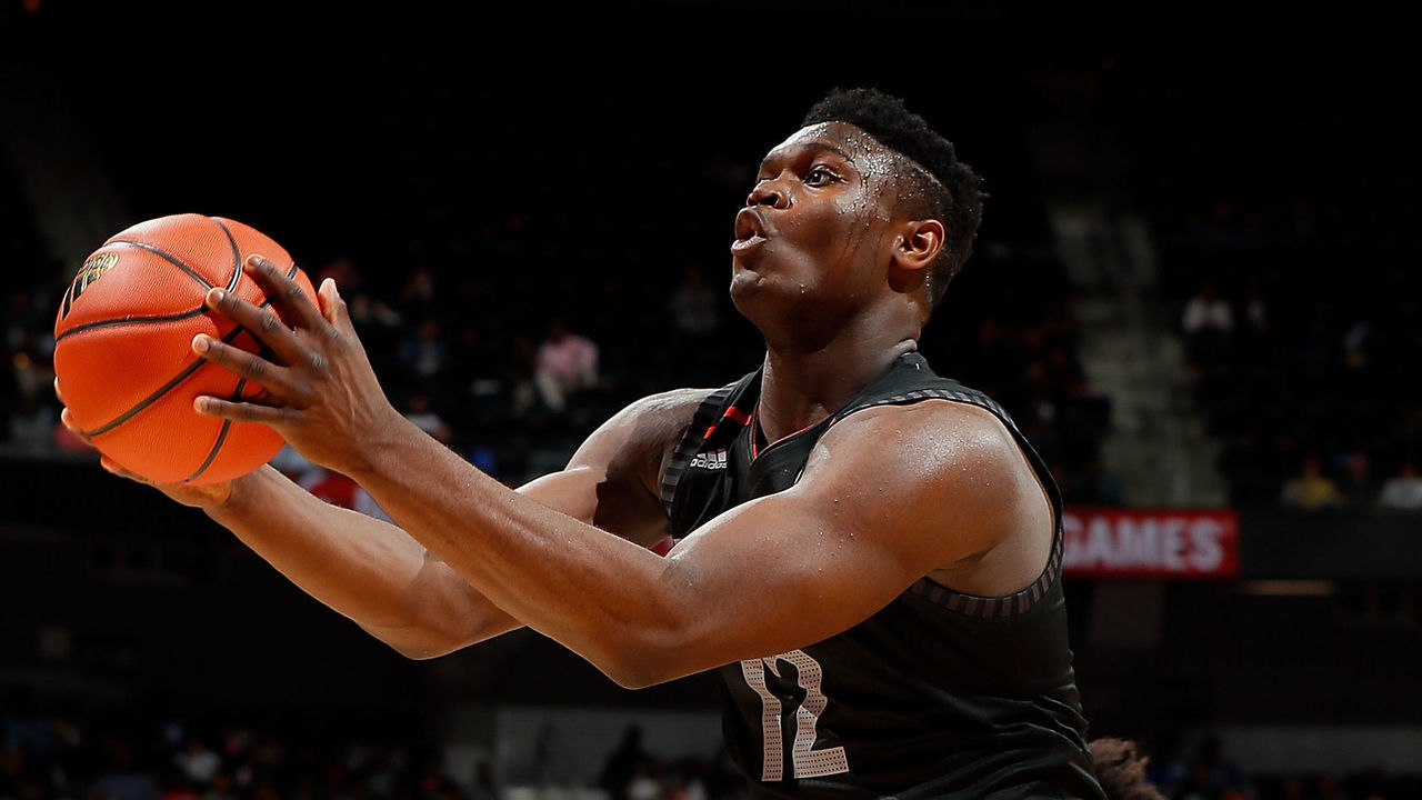 ATLANTA, GA - MARCH 28: Zion Williamson #12 of Spartanburg Day School attacks the basket against Jordan Brown #21 of Prolific Prep during the 2018 McDonald's All American Game at Philips Arena on March 28, 2018 in Atlanta, Georgia.