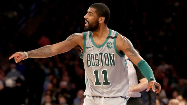 NEW YORK, NY - FEBRUARY 24: Kyrie Irving #11 of the Boston Celtics directs his teammates in the second half against the New York Knicks at Madison Square Garden on February 24,2018 in New York City.