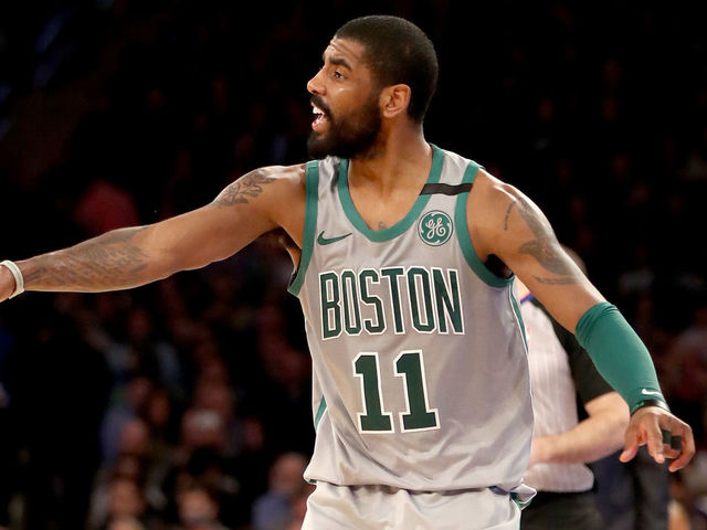 NEW YORK, NY - FEBRUARY 24: Kyrie Irving #11 of the Boston Celtics directs his teammates in the second half against the New York Knicks at Madison Square Garden on February 24,2018 in New York City.