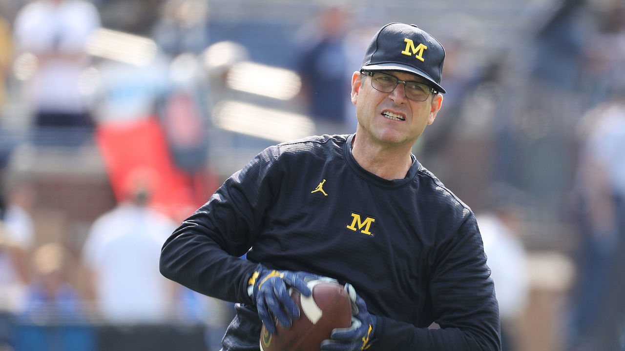 ANN ARBOR, MI - SEPTEMBER 16: Michigan Wolverines head football coach Jim Harbaugh watches the pregame warm ups prior to the start of the game against the Air Force Falcons at Michigan Stadium on September 16, 2017 in Ann Arbor, Michigan.
