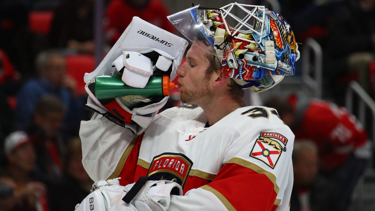 DETROIT, MI - DECEMBER 11: James Reimer #34 of the Florida Panthers drinks water while playing the Detroit Red Wings at Little Caesars Arena on December 11, 2017 in Detroit, Michigan.