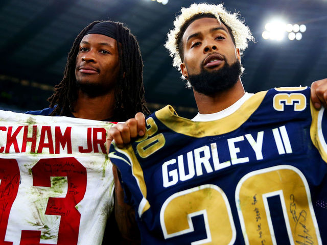 LONDON, ENGLAND - OCTOBER 23: Odell Beckham #13 of the New York Giants and Todd Gurley #30 of the Los Angeles Rams swap signed shirts after the NFL International series game between Los Angeles Rams and New York Giants at Twickenham Stadium on October 23, 2016 in London, England.